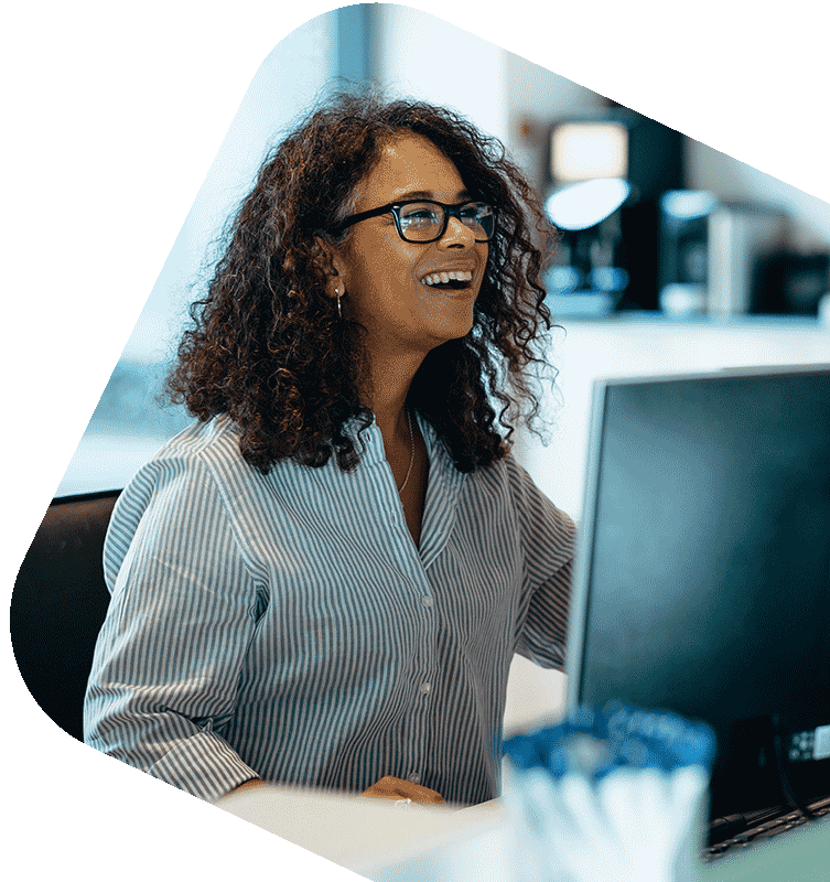 Happy office worker at their PC